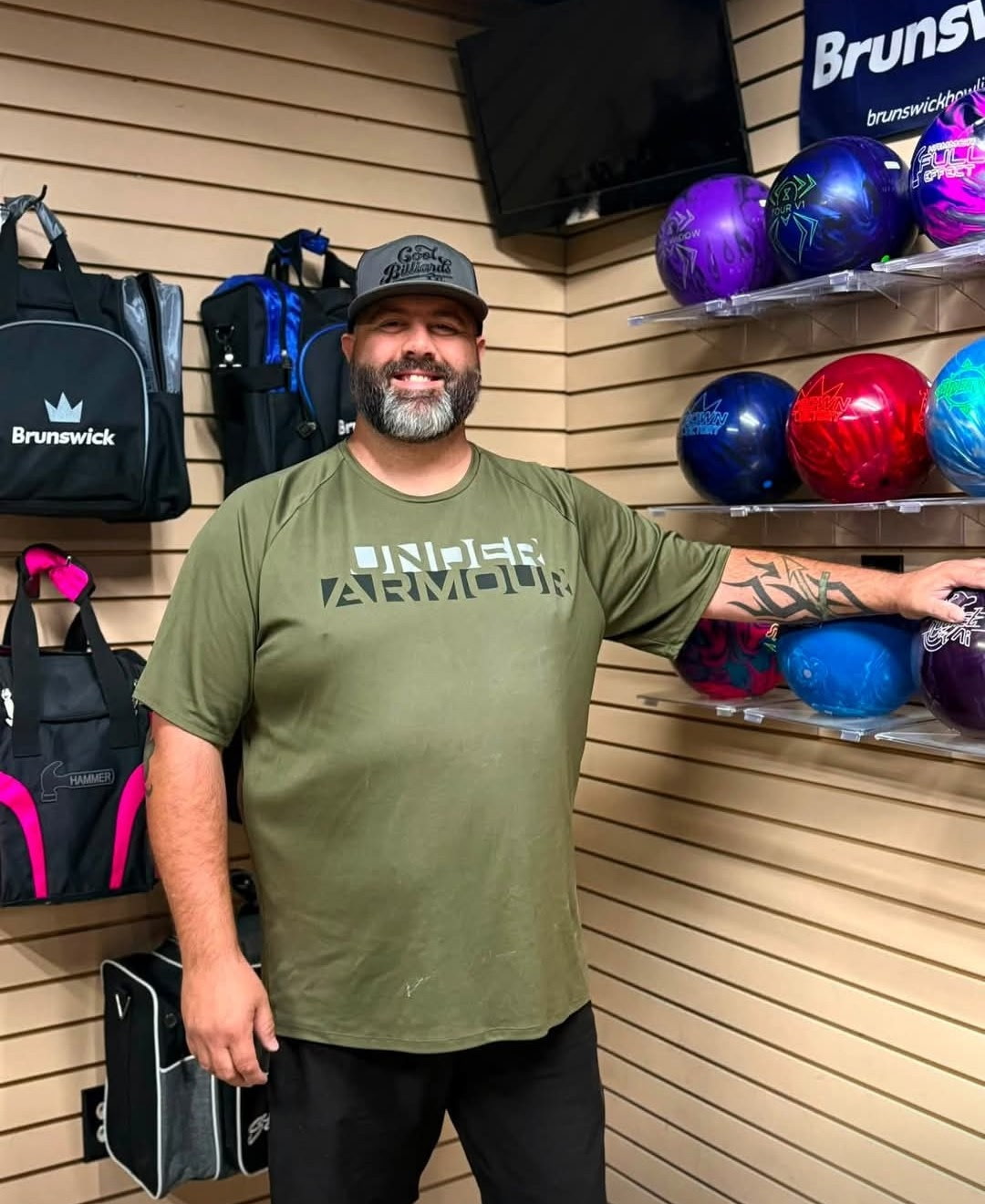 Peter Balderas at the pro shop counter